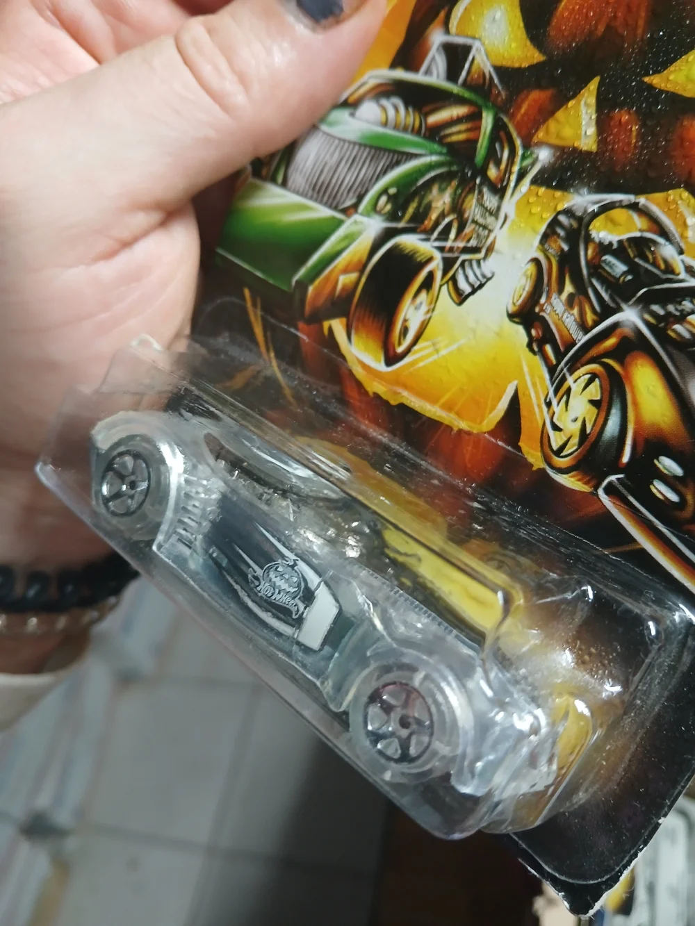Hot Wheels Covelight Halloween themed series,  silver/clear Car Pumpkin Logo 3/6